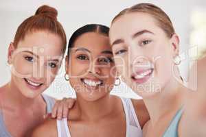 Closeup on face of friends taking a selfie. Happy friends taking a photo in pilates class. Group of beautiful friends taking a selfie in yoga class. Friends bonding before exercise class