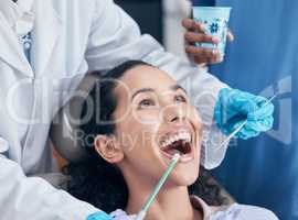 Youre almost ready. Shot of a young woman having a procedure performed by her dentist.