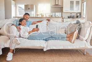 Did you see this video. a woman using her cellphone while relaxing on the couch with her spouse.