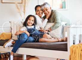 Family love is forever. Shot of a grandmother spending time with her daughter and grandchild at home.