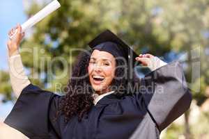 Shes beyond happy with her outstanding achievement. Portrait of a young woman cheering on graduation day.