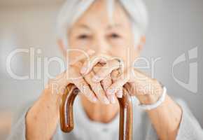 I needed more support as the years went by. Closeup shot of a senior woman holding a walking stick.