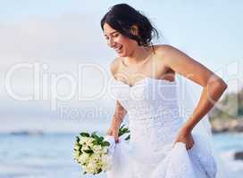 Ive been dreaming about this day. a beautiful woman on the beach on her wedding day.
