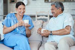 Visiting her patients isnt part of her job description. a handsome senior man and his female nurse in the old age home.