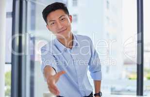 Portrait of one asian businessman extending hand forward to greet welcome with handshake. Networking and meeting for interview to agree on deal or offer. Collaborating on negotiation for job promotion