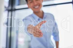 Closeup of one business man extending hand forward to greet and welcome with handshake. Networking and meeting to agree on deal or offer. Consulting and collaborating on negotiation for job promotion