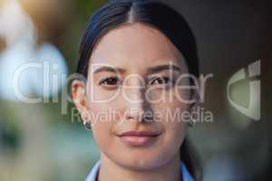 Closeup portrait of mixed race womans face and eyes looking forward and into the camera. Zoom headshot of a hispanic woman staring and watching in front. Healthy eyecare for clear optics and vision