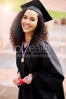 I am so damn proud of myself. Portrait of a young woman wearing a medal on graduation day.