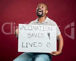 African american covid vaccinated man showing and holding poster. Shouting black man isolated on red studio background with copyspace. Excited model with sign to promote corona vaccine and motivate