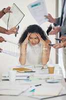 I think my head may explode. a businesswoman looking stressed during a business meeting.