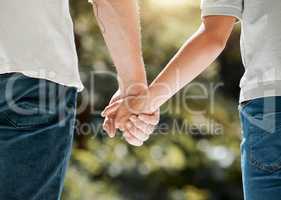 I want to grow old by your side. Cropped shot of an unrecognizable couple holding hands.