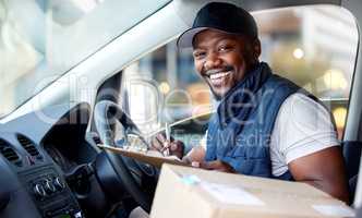 Your parcel is on its way. Shot of young man delivering a package while sitting in a vehicle.