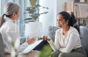 How do I stop it from happening. an attractive young woman sitting and talking to her psychologist during a consultation.
