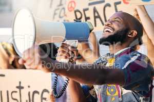 Stand up for what is right. a group of young people protesting in the city.