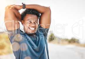 Exercise is labor without weariness. a sporty young man stretching before a run outdoors.