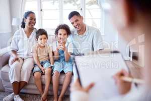 Their weekly sessions have been so beneficial. Shot of a family meeting with a therapist.