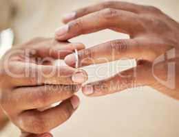 Man removing wedding band. Male hands taking off ring before going out to cheat. Finalising divorce