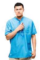 Been feeling off kilter lately. Shot of a young male nurse using his stethoscope against a studio background.