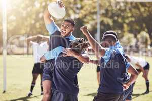 Diverse rugby teammates celebrating scoring a try or winning a match outside on a sports field. Rugby players cheering during a match after making a score. Teamwork ensures success and victory