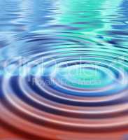 Closeup of abstract ripple effect of water with blue reflection with wave pattern and texture. Detail of hypnotizing psychedelic background of fluid color spectrum and cosmic art or esoteric surface