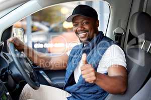 I always deliver on time. young man delivering a package while sitting in a vehicle.