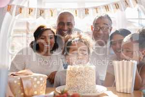 Your age isnt you. Use today to feel your best. a happy family celebrating a birthday at home.