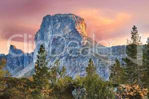 Scenic mountain landscape view with forest trees and blue sky in Norway, with copy space. Beautiful scenic view of nature with vibrant lush trees around an iconic natural landmark on a sunny day