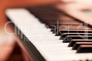 Closeup shot of black and white piano keys. Above shot of a sharp and flat piano keys. Music can motivate and inspire. Let your creative juices flow into your art through the rhythm and sound of music