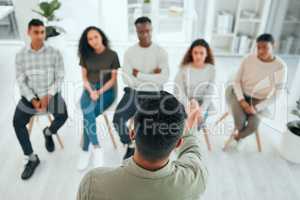 Each one of you have a story to tell. an unrecognisable man standing and talking to his support group.