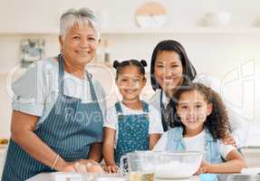 We hope everyone knows how fun baking is. a multi-generational family baking together at home.