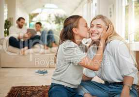 Your kisses make my heart swell. a young girl kissing her mother on the cheek.