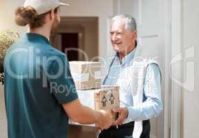 I love how speedy you are. a senior man receiving his delivery from the courier.
