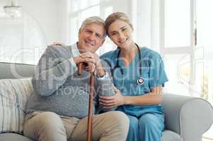 Emotionally invested in her patients health. a doctor and patient during a checkup at home.