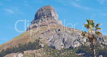 Panorama of Lions Head, Cape Town, South Africa. Landscape of a beautiful rocky mountain peak on a summer day. Scenic view of nature with a blue sky background. Peaceful summit with copy space