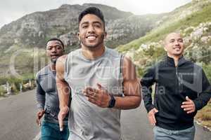 I love that the guys joined me on this journey. three men out for a run on a mountain road.