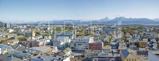 Scenic landscape of the city of Bodo in Nordland, Norway with lush surroundings, panoramic mountain and clear sky background with copyspace. Peaceful coastal suburb with breathtaking views