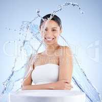 m a better person when Im moisturized. a young woman washing herself against a blue background.