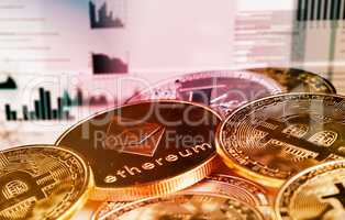 Diversify your crypto portfolio. Conceptual image of cryptocurrency coins against a red background.