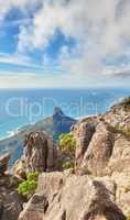 Aerial view of table Mountain in South Africa on a sunny day with copy space. Peaceful morning with views of the blue ocean and Lions Head in Cape Town. Tranquil, serene and calming harmony in nature