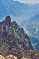 Rocky landscape of mountains and hills in the remote area of La Palma, Canary Islands, Spain. Scenic view of mother nature, dirt and flora. The calm and beauty of nature