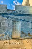 Mysterious white door to a house or venue in Santa Cruz de La Palma in Spain. Beautiful cultural and traditional architecture in a small village. Old and ancient exterior of a building structure