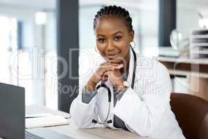 Ready to help you recover. a beautiful young doctor in her office.