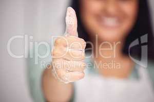 Yes to lots of soap. a woman showing thumbs up with her soapy hands.