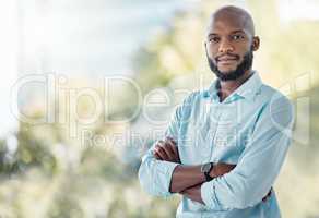 Feeling stronger and more confident every day. a young businessman taking a break during his work day.