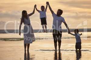 Knock on wood, itll always stay good. a beautiful family bonding while spending a day at the beach together.