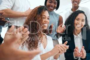 Every achievement deserves an applause. a group of businesspeople having a meeting in a modern office at work.