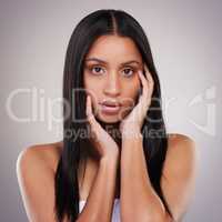 Feeling extra confident today. an attractive young woman posing alone in the studio.