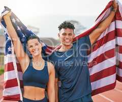 We win as one. Cropped portrait of two young athletes celebrating their victory while representing their country.