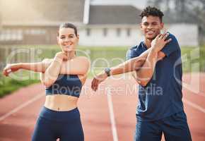 You cant win a race before you start, but you can lose a race before you start. Cropped portrait of two young athletes warming up while standing out on the track.