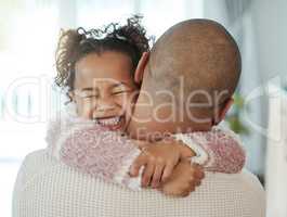 Never forget to cherish every single moment. an adorable little girl embracing her father.